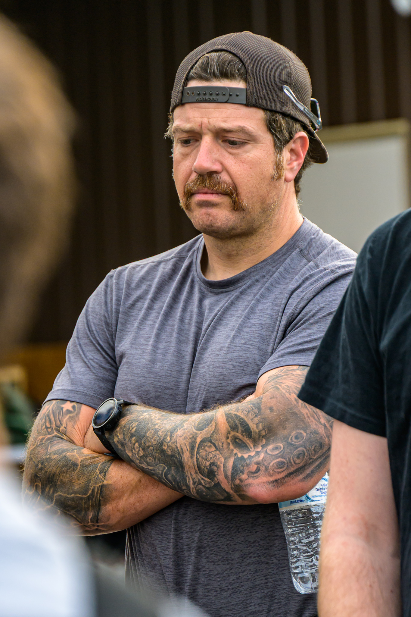 Instructor listening to trainees